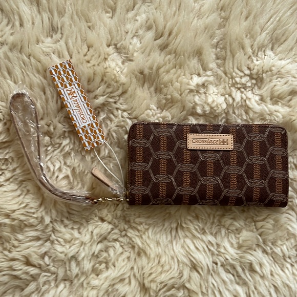 Crosslace Handbags - NWT Crosslace leather wristlet,lacrosse weave print leather and natural leather